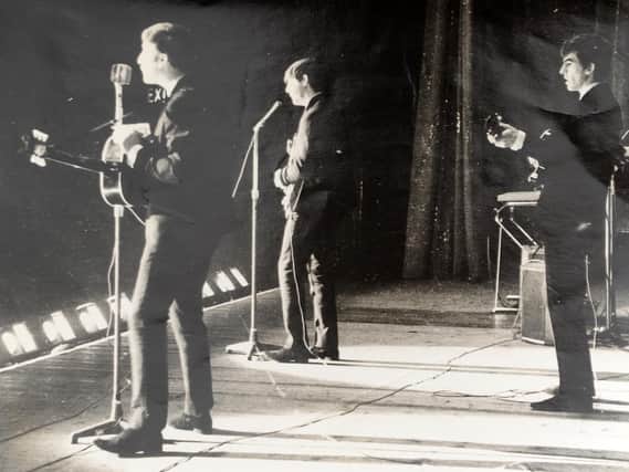 The Beatles on stage at The Gaumont.