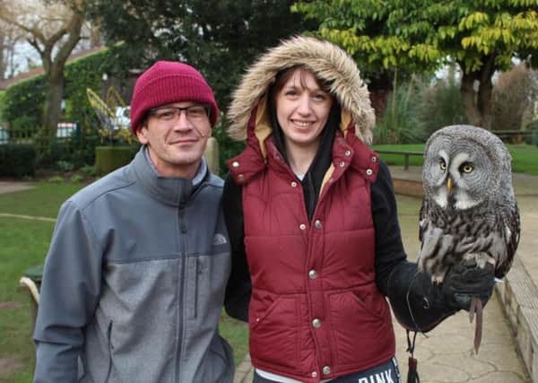 Pete Tingle and his fiancee Laura Wattam with the great grey owl who delivered her engagement ring