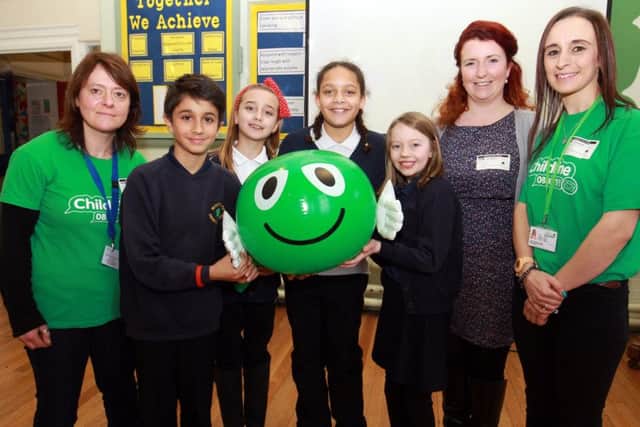 The NSPCC ChildLine Schools Service visited Woodseats Primary School. The School Service educates children about abuse, including bullying, neglect, physical, sexual and emotional abuse. Pictured are Michaela Crowther and Kathy Cookson from the service, Louise Haigh MP and pupils George, Erin, Dianttae, and Maddison.
