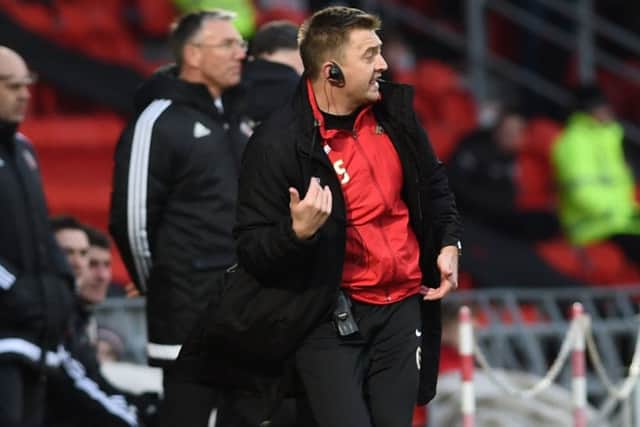 Rovers assistant boss Gavin Strachan stands in for Darren Ferguson who was serving a touchline ban