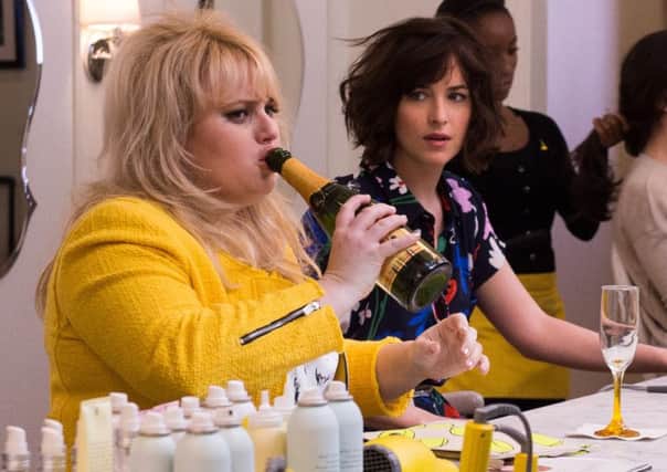 How To Be Single. Pictured: DAKOTA JOHNSON as Alice and REBEL WILSON as Robin: PA Photo/Claire Folger/Disney.