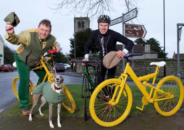 Doncaster Olympic and Commonwealth road cyclist John Tanner (right) with "Tyke" Paul Hall, proprietor of Sprotbrough Country Club and whippet Tigger.