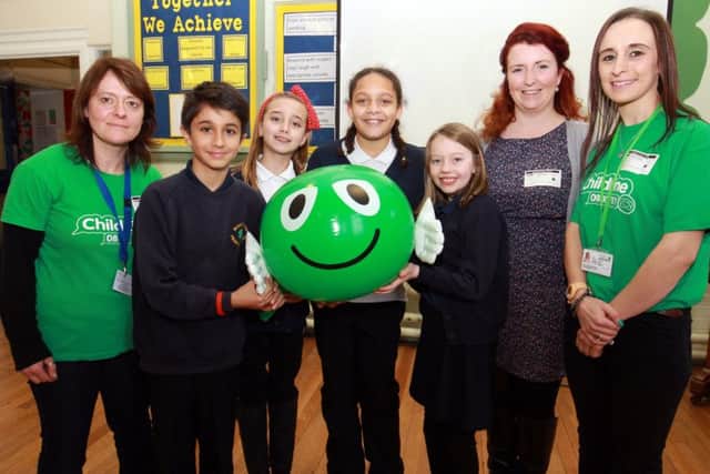 The NSPCC ChildLine Schools Service visited Woodseats Primary School. The School Service educates children about abuse, including bullying, neglect, physical, sexual and emotional abuse. Pictured are Michaela Crowther and Kathy Cookson from the service, Louise Haigh MP and pupils George, Erin, Dianttae, and Maddison.