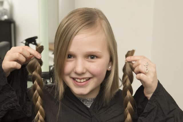 Casey Hunston having her hair cut for Little Princess Trust at Barrons salon in Swinton