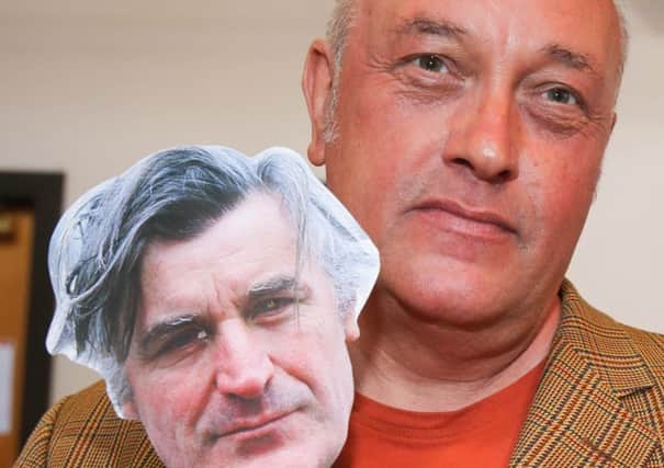 Ted Hughes Festival, Mexborough Business Centre  Ian Parks with Ted Hughes face on a stick