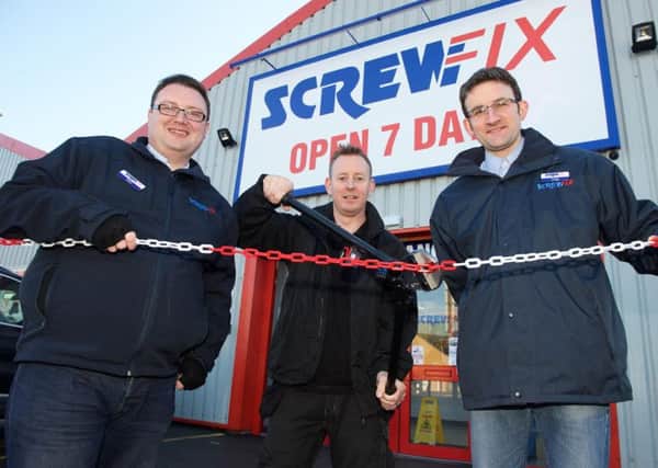ScrewFix opening at SwintonManager Mark Field, customer Justin Howard of JW Solutions and Asst manager Craig Shaw perform the opening ceremony outside the storePix : Dean Atkins / deanatkinsphotography.co.ukCOPYRIGHT PICTURE >> DEAN ATKINS>07546 936 188> 01226 719561>