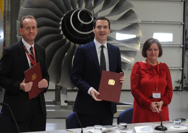 George Osborne with Sheffield City Council leader Julie Dore and Barnsley Council leader Sir Steve Houghton at last year's signing ceremony