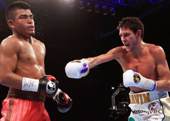 Gavin McDonnell (right) and Jorge Sanchez during their Vacant WBC Silver & Eliminator Super-Bantamweight Championship bout at Manchester Arena.