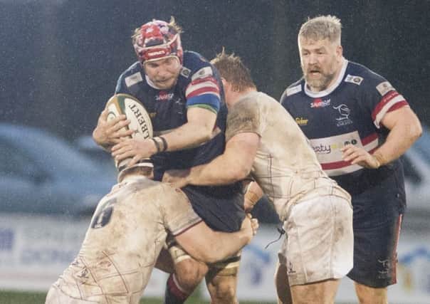 Michael Hills (centre) and Colin Quigley (right) this week signed new deals with Doncaster Knights