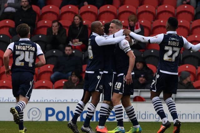 Steve Morison is congratulated after giving Millwall an early lead