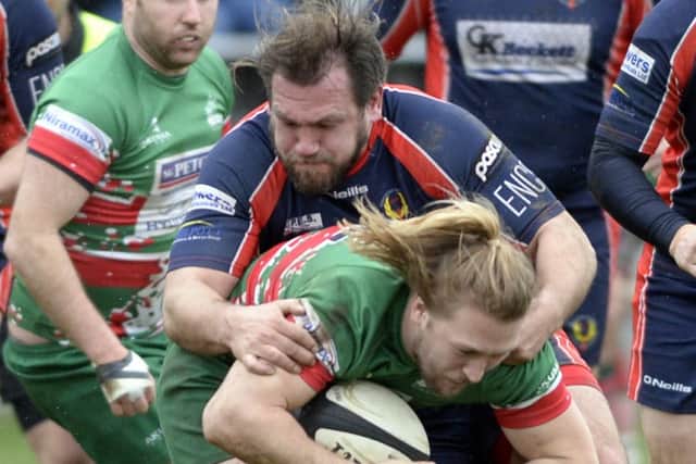 Andy Ellis scored twice in Phoenix's win over Hull Ionians.