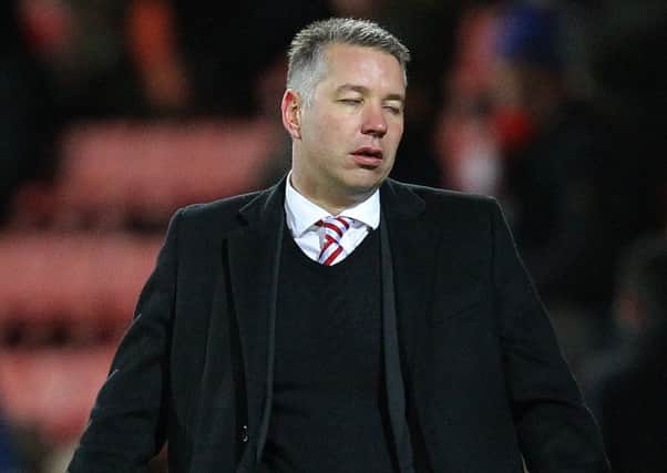Rovers boss Darren Ferguson shows his frustration during Tuesday night's defeat at Swindon.