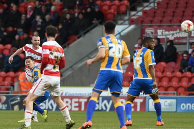 Rovers' Luke McCullough fine shot produced a finger tip save from the Shrewsbury keeper