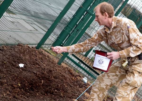 Steven Abel, Facilities Manager, pictured scattering Poppy seeds at Ashworth Barracks. Twenty Million Poppy seeds are to be planted along with 2000 plants, shrubs and trees to help create the Memorial Garden. Picture: Marie Caley NDFP Ashworth Poppies MC 2