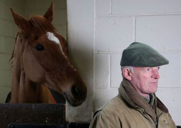 Trainer Willie Mullins with Annie Power. Photo: Brian Lawless/PA Wire.