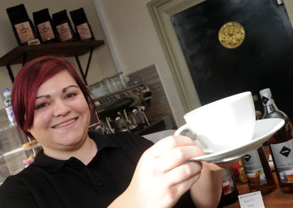 Steph Trickett, of Bank Coffee House, Swinton with a cup of coffee. Picture: Andrew Roe