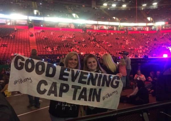 Ami Downs, 15, with mum Kelly Lindley at a Take That gig