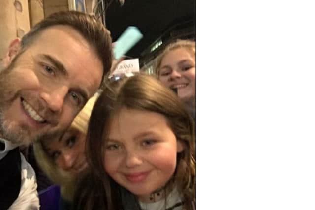 Ami Downs (front right) with her idol Gary Barlow