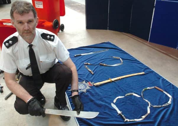 Knife Amnesty 1. Inspector David Owens with some of the 1218 Knives and sharp implements that were handed in during the recentknife amnesty.