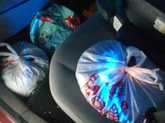 Police have arrested a man who was found to be travelling with carrier bags full of a cannabis on the back seat of his car as he made his way along a Doncaster stretch of motorway. Picture courtesy of North Yorkshire Police.
