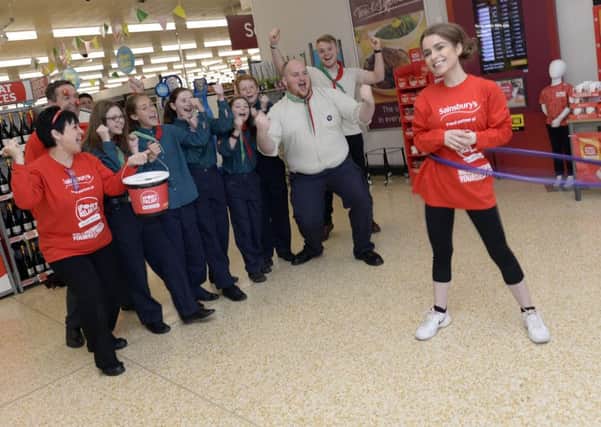 Bethany Cuttell-Bladen, 19,  doing a hula hoop challenge for 2.5hours for Sport Relief at Sainsburys, Edenthorpe.