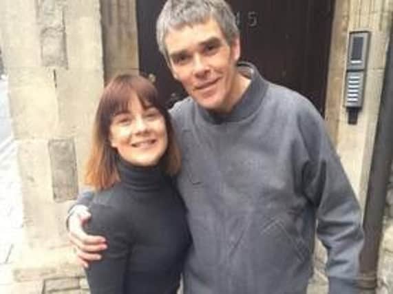 Sheffield woman Stevie Birchall with The Stone Roses' lead singer Ian Brown outside The Church Studios in North London