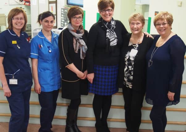 Scunthorpe Hospital stroke unitb donation -  (from left) Lynne Shackleton, deputy ward manager; Marie Parkin, staff nurse; Angela Cuthbert, daughter; Debbie Hayward, daughter; Sheila Thomson, wife; Kay Hayle, daughter.