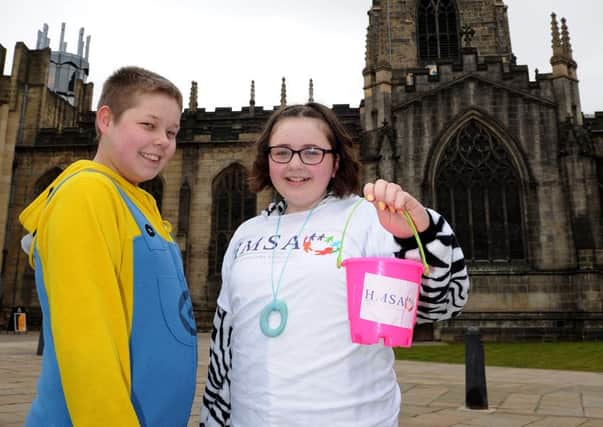 Lauren Williams, 13 and Jordan Armstrong, 14 have walked from Shiregreen to Sheffield Cathedral to raise money for HMSA as Lauren suffers from hypermobility syndrome. Picture: Andrew Roe