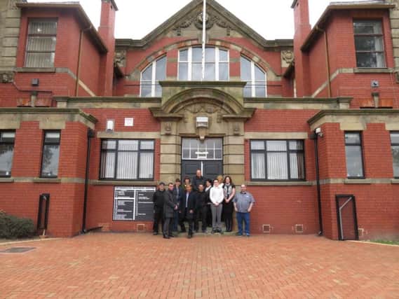 A local family run facilities management company have purchased a new business within an iconic local landmark - Mexborough Business Centre. N and S group, who have their offices based in the premises, bought the business at the end of last year, when the centre was threatened with closure. Pictured are staff and tenants.