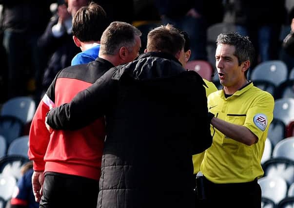 Darren Ferguson confronted referee Darren Bond after the game