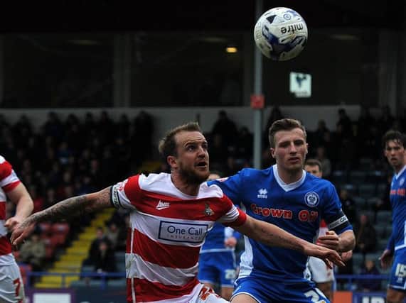 James Coppinger battles for the ball at Rochdale