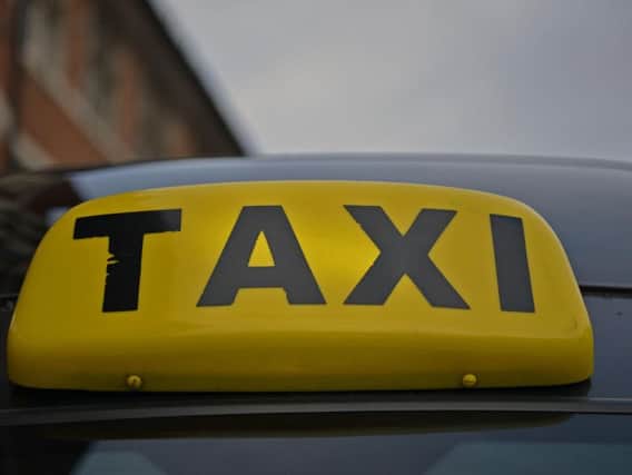 A Doncaster taxi driver has lost his license after he paid another man to take his penalty points for driving his cab through a red light, just 10 weeks after entering the profession.