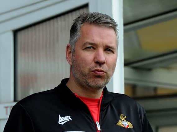 Darren Ferguson looks on at Bury