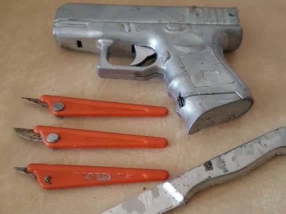 Weapons including knives and a plastic BB gun found in a Dearne playground have been handed in to police.