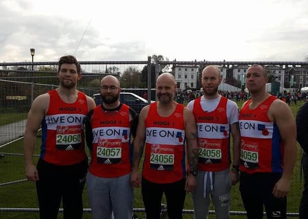 Marathon runner Mark Midgley and his four sons, Jamie, Daniel, Kyle and Taylor who are all running the London mararthon to raise money for the British Legion.
