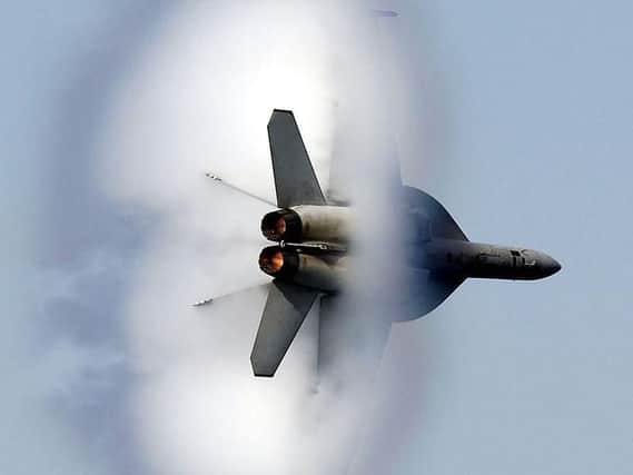 An aircraft creating a sonic boom. (Photo: US Navy).