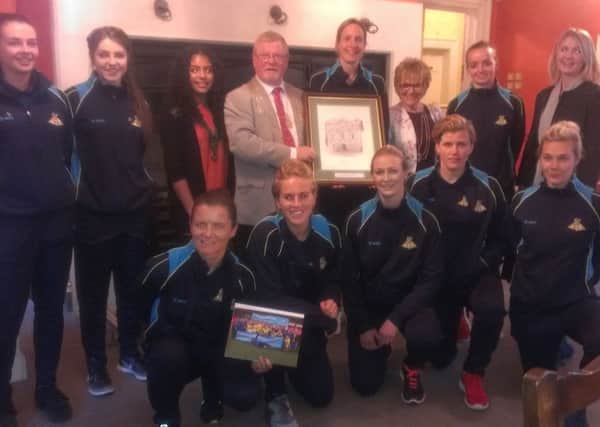 Doncaster Belles and a civic reception in their honour with the Mayor and Mayoress of Doncaster. They were given a civic gift of a historic picture of the Mansion House.