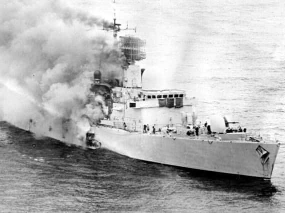 HMS Sheffield ablaze in the South Atlantic on May 4, 1982.
