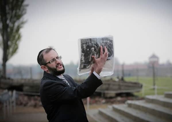 Rabbi Raphy Garson delivers a memorial to those killed in Auschwitz at the Auschwitz Birkenhau 'death camp'.