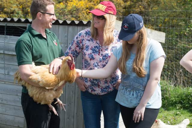 Chicken Keeping for Beginners held at Bank View Farm, Lane Head Road, Totley
Alex Wall chats chickens with a couple of future chicken keepers
Picture Dean Atkins