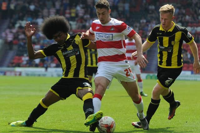 Tommy Rowe in action against Burton. Photo: Andrew Roe