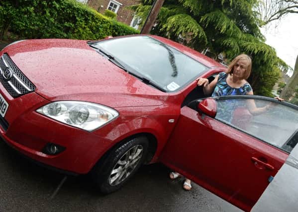 Hille Harris, of Epworth, had her car broken into when she stopped to warn other drivers about horses on the road. Picture: Marie Caley NEPB Harris MC 4
