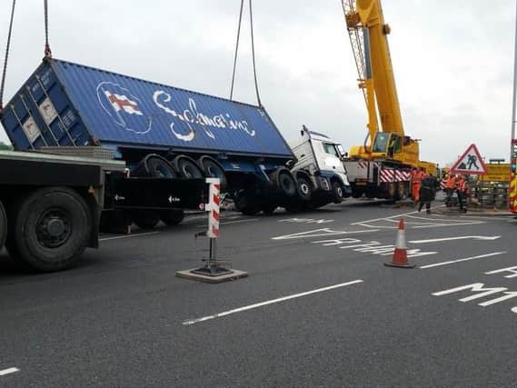A recovery operation is underway after a lorry overturns near Sheffield