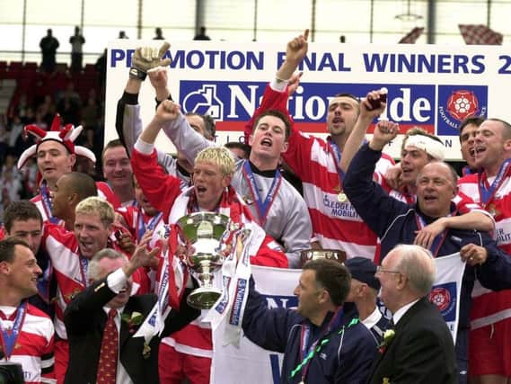 Doncaster Rovers celebrate their return to the Football League.