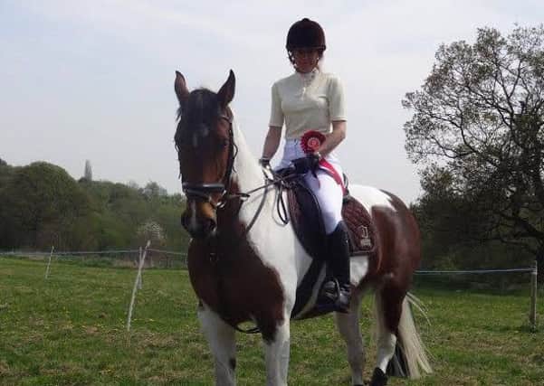 Anita and her horse 'April' enjoying showjumping together at a local show.