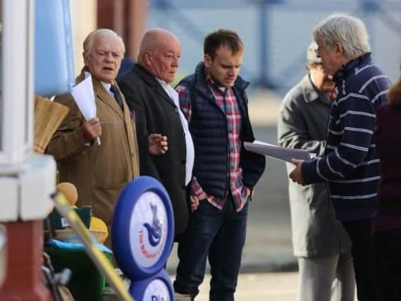 Tim Healy (centre) filming Still Open All Hours in Doncaster with Sir David Jason (left) and James Baxter.