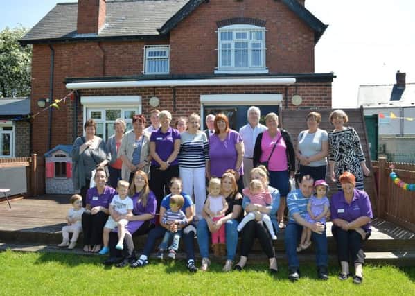 Staff, parents, children and supporters celebrate Station House Community Associations new building extension.