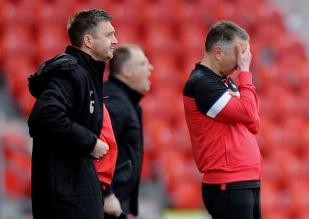 Darren Ferguson shows his anguish as Rovers slide out of League One.