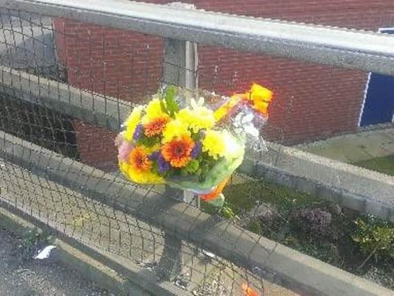 Tributes left at the scene of the crash in Doncaster Road