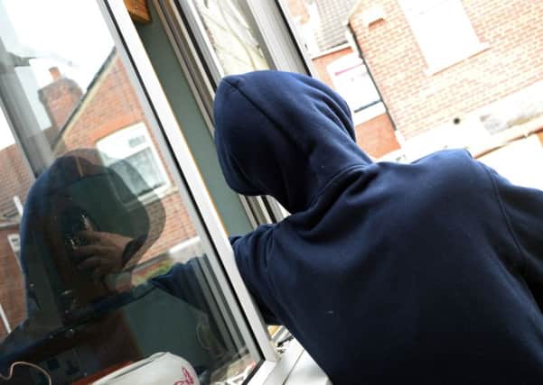 With warm weather comes an increase in Summer related crimes. According to Police, thefts from homes and cars rise as people leave windows and doors unlocked. (Picture posed by model).